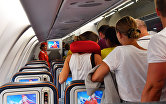 Пассажиры выходят из самолета авиакомпании "Аэрофлот"