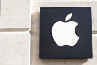 Знак Apple на фасаде дома.