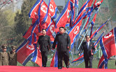 Глава КНДР Ким Чен Ын во время торжественной церемонии открытия жилого комплекса на улице Рёмён в Пхеньяне