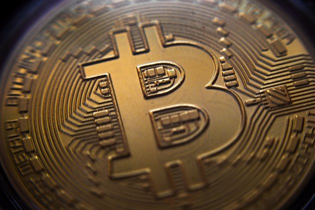 Сувенирная монета криптовалюты биткойн в MaRSe Bitcoin Center в Москве Сувенирная монета криптовалюты биткойн в MaRSe Bitcoin Center в Москве