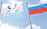 Флаги организации "Росатом" и России