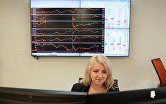 Сотрудница в офисе группы "Московская Биржа ММВБ-РТС"