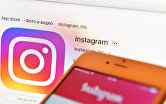 " Иконка социальной сети Instagram на экране ноутбука