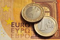 " Монеты номиналом 1 евро и банкнота номиналом 50 евро