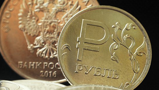 Монета номиналом один рубль с символикой Российского рубля