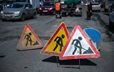 Знаки "Дорожные работы" на улице Кирова в Омске, где проходит ремонт дорожного покрытия