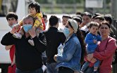 Ситуация у миграционного центра в Подмосковье