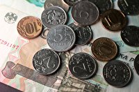 Монеты номиналом 1, 2, 5 и 10 рублей