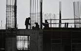 Рабочие на строительной площадке