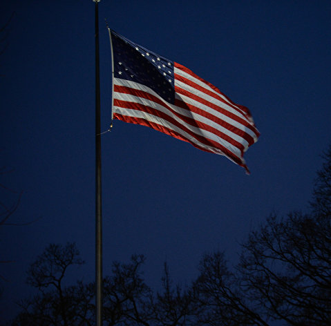 Флаг США у здания миссии США при международных организациях в Женеве