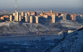 Вид из фанпарка "Бобровый лог" на левобережный микрорайон Студенческий городок и жилой комплекс "Орбита" в Красноярске.