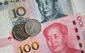 Денежные купюры и монеты китайских юаней