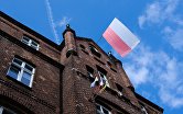 Флаг Польши на здании в Познани, Польша