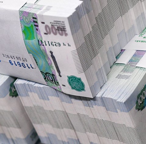 Пачки с банкнотами номиналом одна тысяча рублей