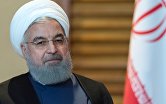 Президент Ирана Хасан Роухани во время встречи с президентом РФ Владимиром Путиным и на полях саммита Шанхайской организации сотрудничества в Китае. 9 июня 2018