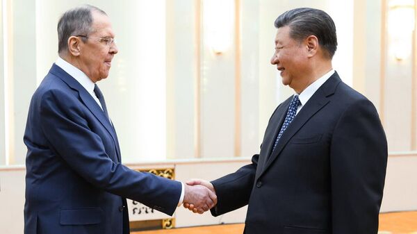 Министр иностранных дел России Сергей Лавров и председатель Китайской Народной Республики Си Цзиньпин