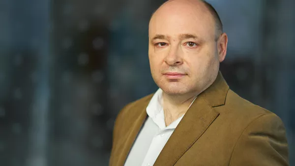 Владимир Корнев, аналитик Цифра брокер. 