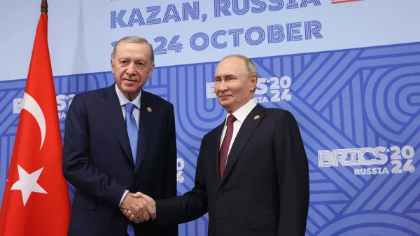 Президент РФ Владимир Путин и президент Турции Реджеп Тайип Эрдоган во время встречи в рамках XVI саммита БРИКС