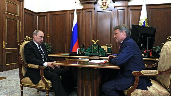 Президент России Владимир Путин и президент, председатель правления Сбербанка России Герман Греф во время встречи в Кремле. 4 августа 2016