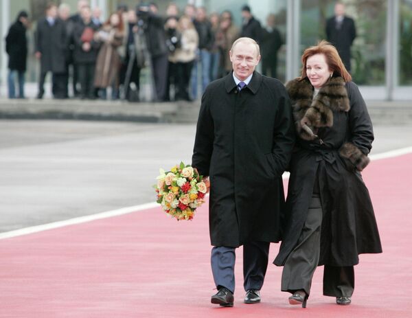 Президент России Владимир Путин с супругой Людмилой Путиной во время встречи президента США