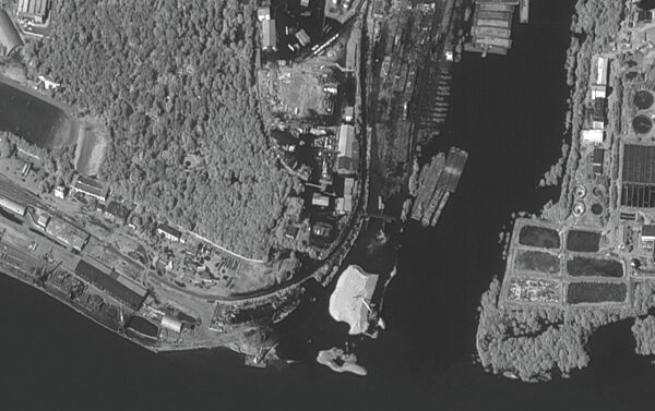 На спутниковых снимках, полученных 19-20 августа с помощью приемных станций УниСкан, отмечаются подтопленные районы Благовещенска.