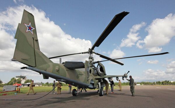 Ка-52 (Аллигатор) — всепогодный круглосуточный боевой вертолет нового поколения. Он предназначен для уничтожения наземных целей, малоскоростных воздушных целей и живой силы противника. Вертолет снабжен устройствами снижения заметности, системой радиоэлектронной защиты и средствами активного противодействия. Жизненно важные системы и агрегаты Ка-52 дублированы и защищены, топливные баки взрывобезопасные, установлена автономная система пожаротушения. Катапультируемые кресла с ракетно-парашютной системой позволяют обоим членам экипажа покидать вертолет на всех режимах полета. На вертолете установлена система отстрела винтов. По уровню бронирования кабины экипажа Ка-52 не имеет аналогов в мире.