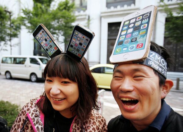 #Поклонники Apple в Токио ждут своей очереди, чтобы приобрести новые iPhone