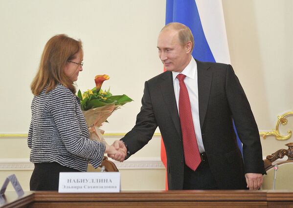 Президент России Владимир Путин и помощник президента Эльвира Набиуллина, 2012 год