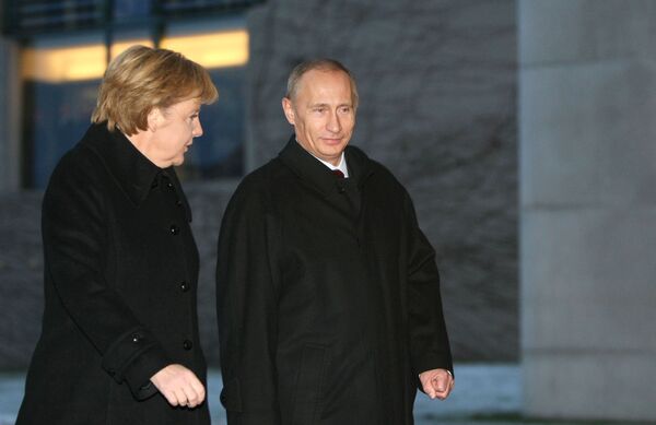 Президент РФ Владимир Путин и канцлер Германии Ангела Меркель