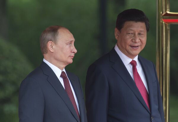 Президент России Владимир Путин и председатель КНР Си Цзиньпин