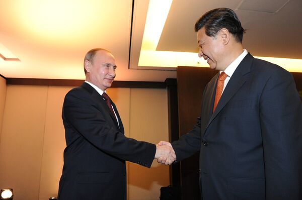 Президент России Владимир Путин и председатель Китайской Народной Республики Си Цзиньпин