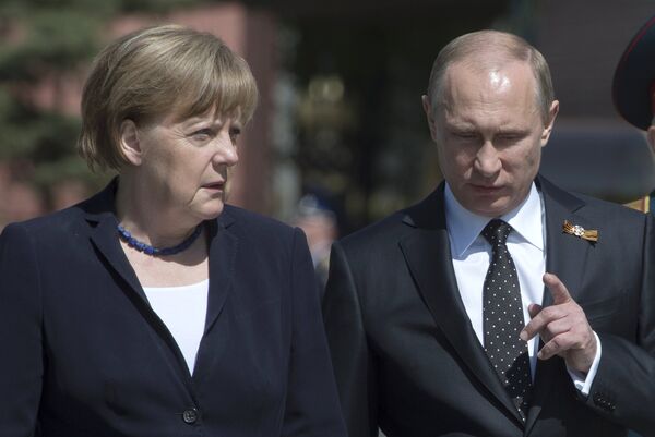 %Владимир Путин и Ангела Меркель
