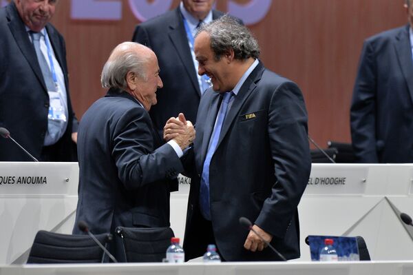 *Президент ФИФА Йозеф Блаттер и президент УЕФА Мишель Платини
