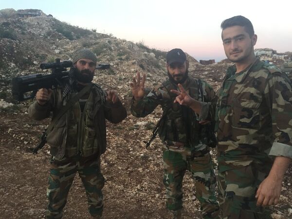 Артиллерийская позиция сирийской армии в районе поселения Араму на севере Латакии в 20 километрах от сирийской границы