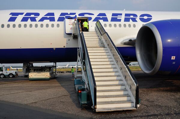 Самолет Боинг-777 авиакомпании Трансаэро в аэропорту. Архивное фото