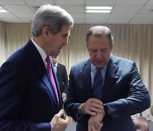 Министр иностранных дел РФ Сергей Лавров и государственный секретарь США Джон Керри во время встречи в рамках 22-й министерской конференции ОБСЕ