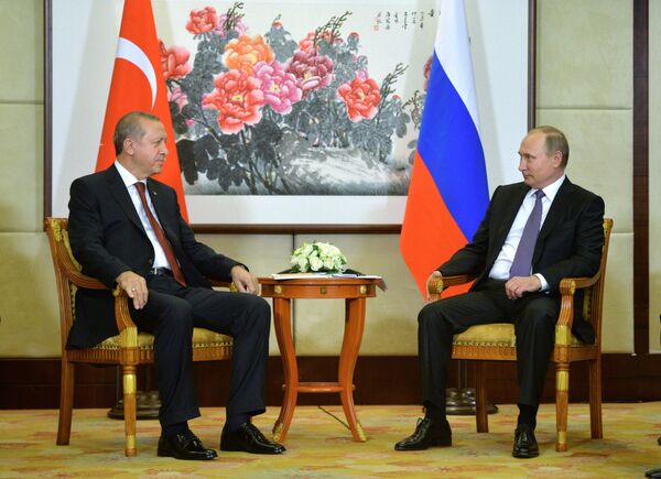 Владимир Путин во время встречи с президентом Турецкой Республики Эрдоганом
