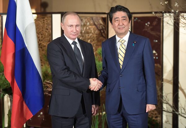 %Президент РФ Владимир Путин и премьер-министр Японии Синдзо Абэ