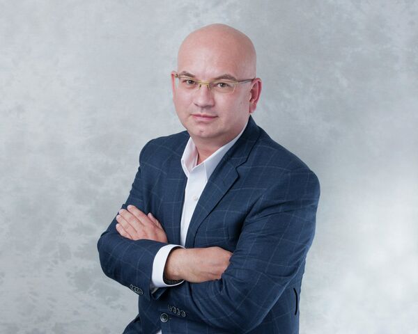 Управляющий партнер по России международной консалтинговой компании EY Александр Ивлев
