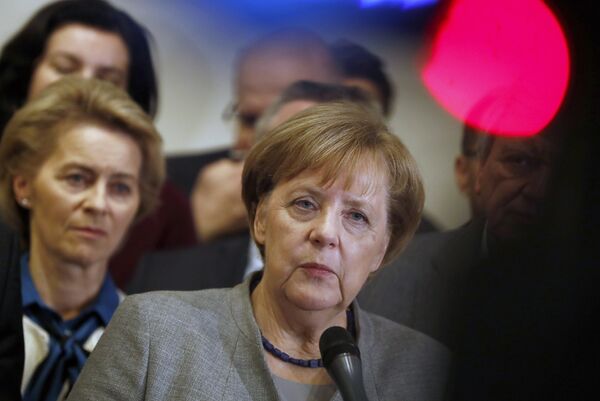 Лидер ХДС, канцлер Германии Ангела Меркель во время пресс-конференции по итогам переговоров о формировании коалиционного правительства в Берлине