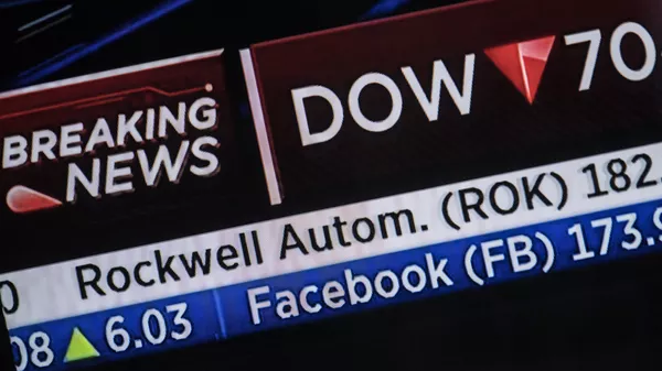 #Котировки акций компании Facebook, показанные на информационной панели биржи NASDAQ