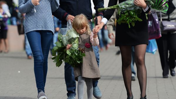 %Москвичи покупают цветы к 1 сентября на Рижском цветочном рынке