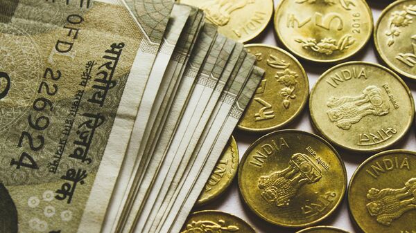 Деньги, рупии, Индия
