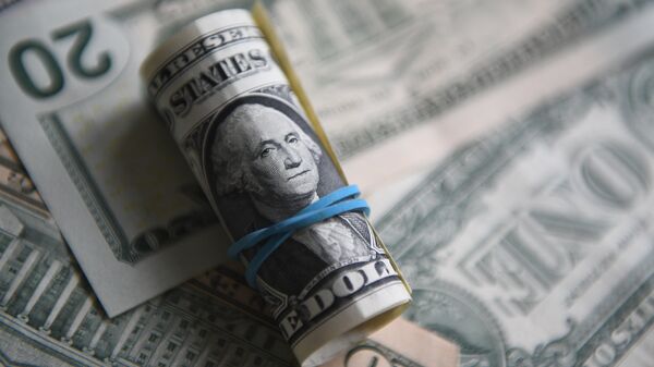 Доллар откатывается после слабых экономических данных в США