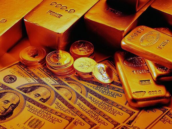 Золото дорожает на удешевлении доллара в связи с позитивными новостями из еврозоны
