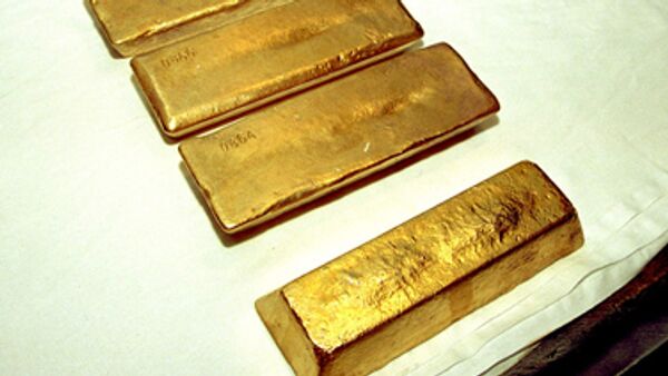 Фьючерсы на золото продолжают рост на новостях из Японии